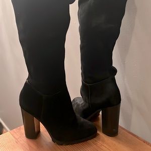 Black tall boots, 19 inches tall, ALDO brand, 4 inch heel. Only worn twice.